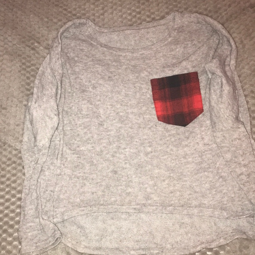 Gray sweater.